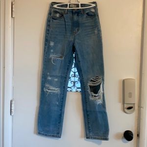 Straight legged distressed jeans